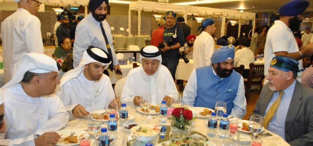 sikh-community-in-dubai-hosts-an-inter-faith-amp-multi-cultural-iftar-at-the-guru-nanak-darbar-1400x653-1527082838_1100x513